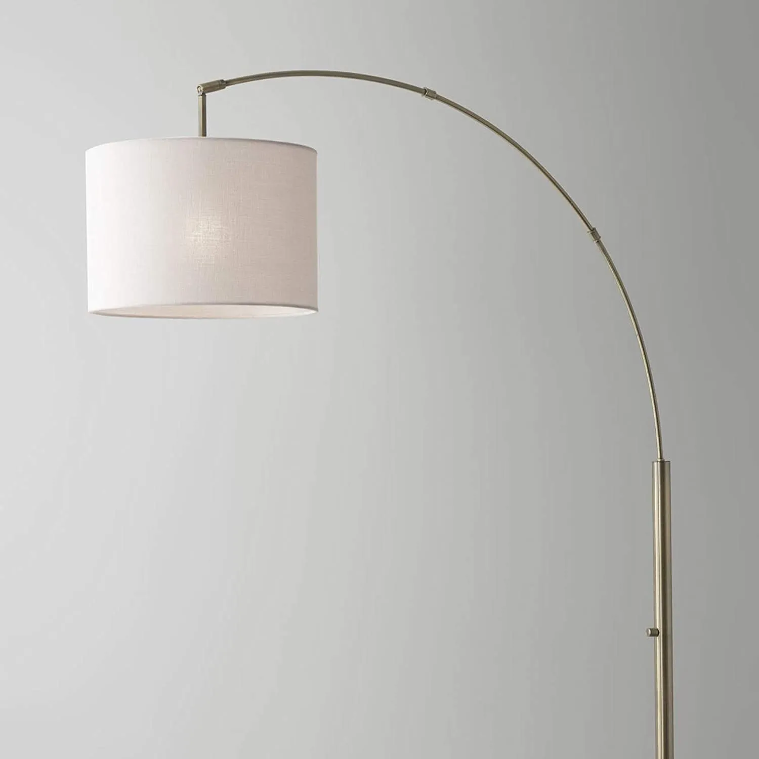 74" Brass Arc Floor Lamp With Off White Solid Color Drum Shade