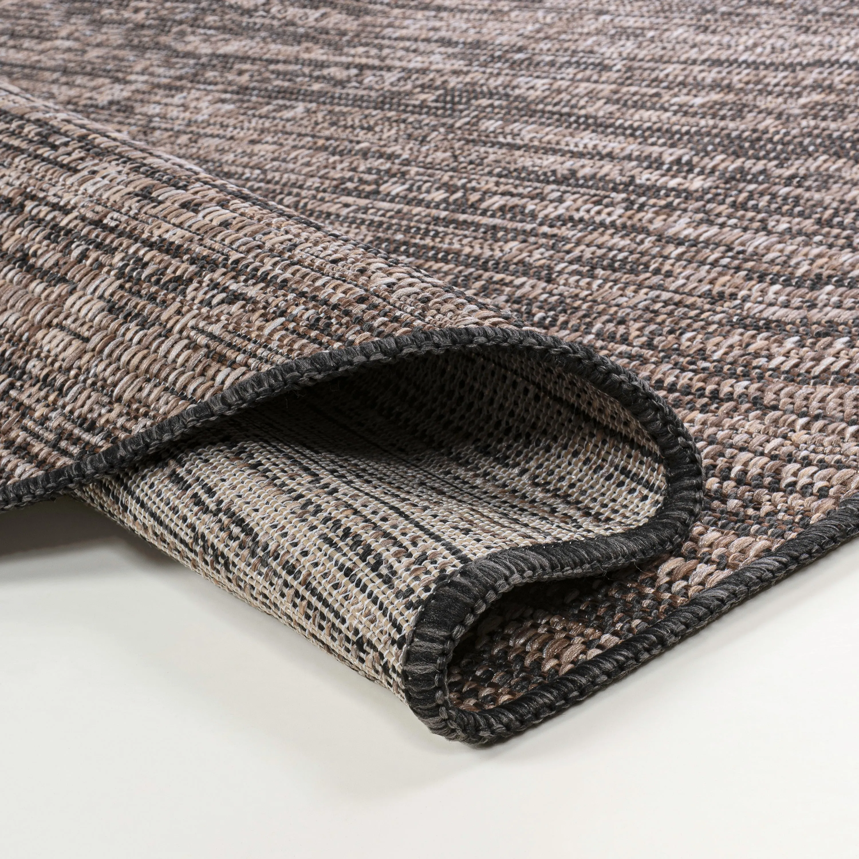 Callan Modern Rustic Abstract Indoor/Outdoor Shaped Area Rug