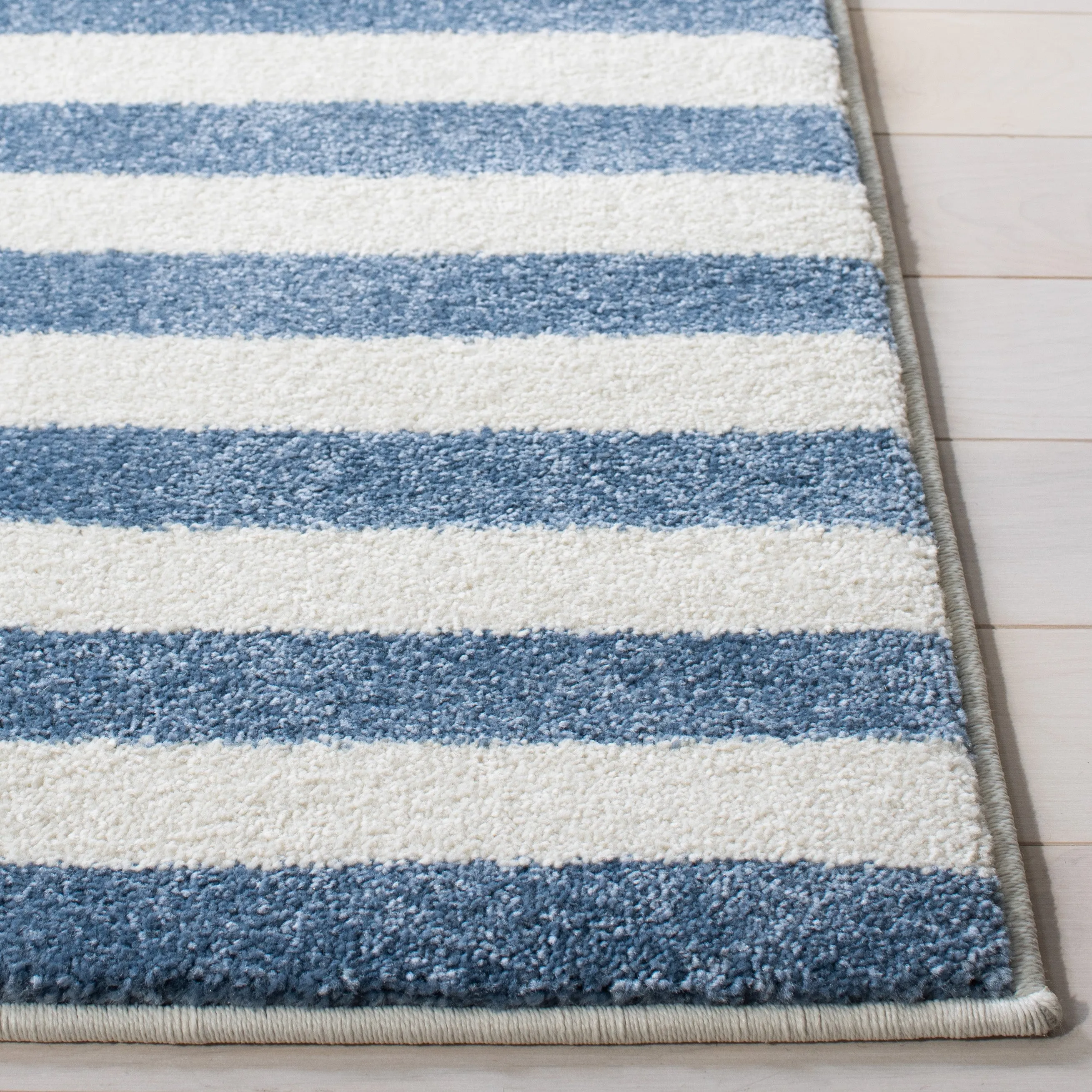 Carousel Kids Machine Made Area Rug, Ivory / Blue Kids Style Easy Care