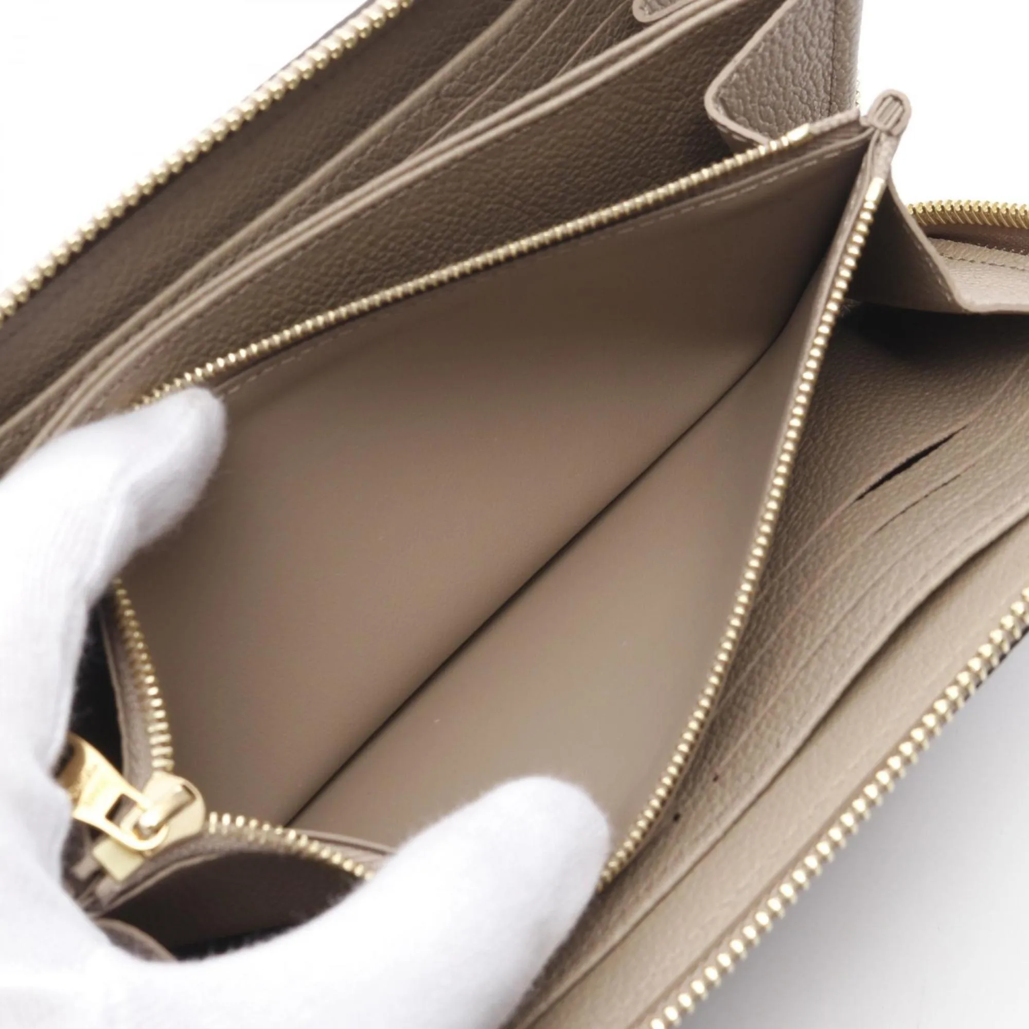 Louis Vuitton ivory Monogram Empreinte Leather Long Wallet (Bi-Fold) (Pre-Owned)