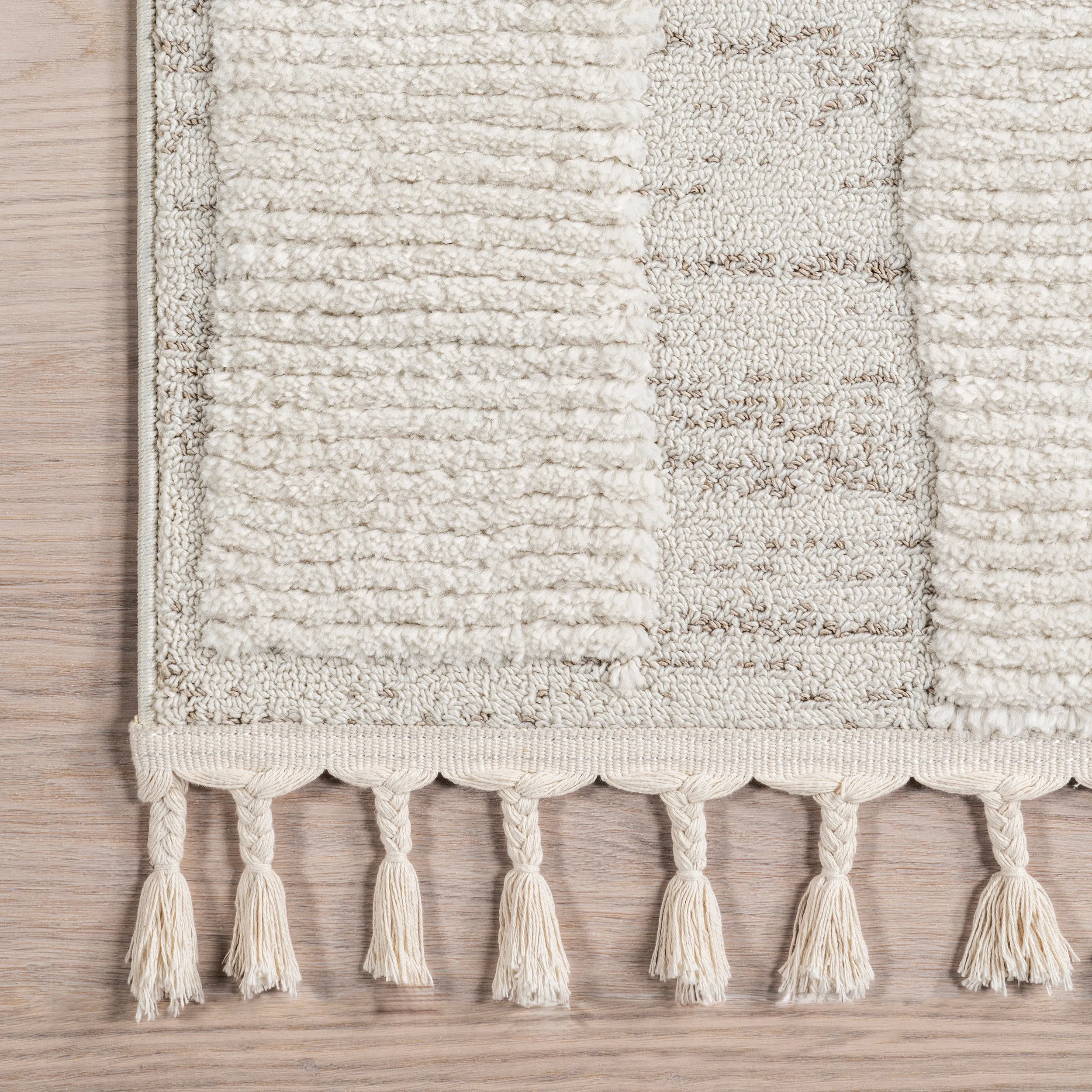 nuLOOM Magnolia High-Low Geometric Tasseled Area Rug