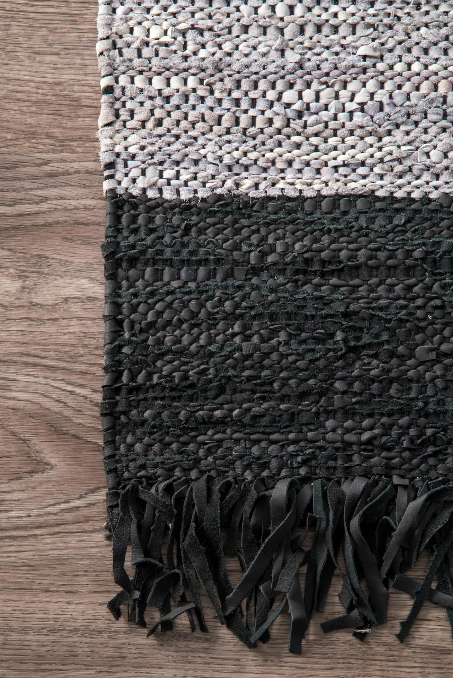 nuLOOM Otha Modern Leather Tassel Area Rug